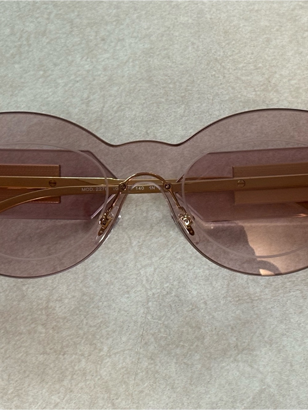 Versace Rimless Pink Sunglasses with Gold Bridge